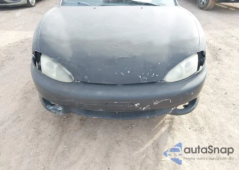 1999 Hyundai Tiburon Fx z USA, uszkodzony, nr VIN KMHJG34F6XU135627